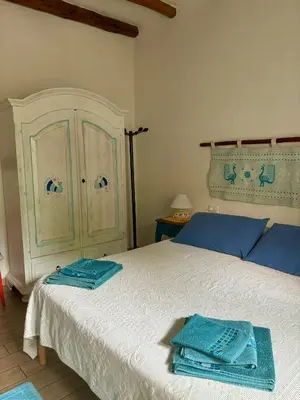 Letto o letti in una camera di B&B Pascal House Nuoro_IUN E5016