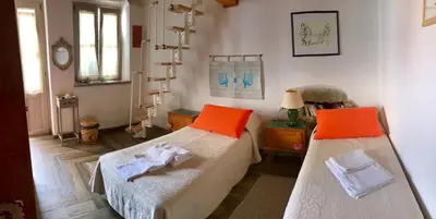 Letto o letti in una camera di B&B Pascal House Nuoro_IUN E5016