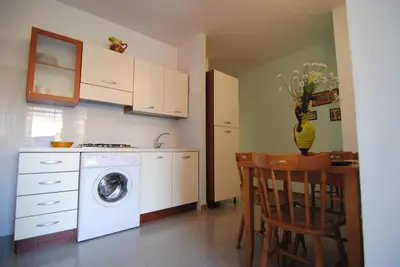 Cucina o angolo cottura di Appartamenti Spiaggia Bianca