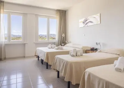Letto o letti in una camera di Hotel De Plam