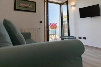 TV o dispositivi per l'intrattenimento presso Antares Rooms and Suites