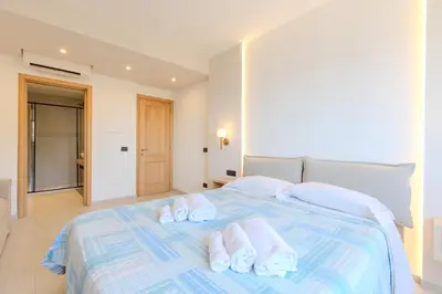 Letto o letti in una camera di Antares Rooms and Suites