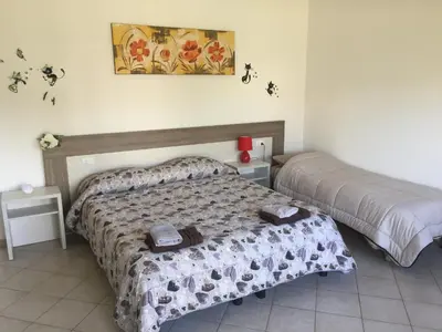 Letto o letti in una camera di La Maison di Zia Annina Olbia