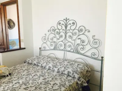 Letto o letti in una camera di La Chiave di Violino