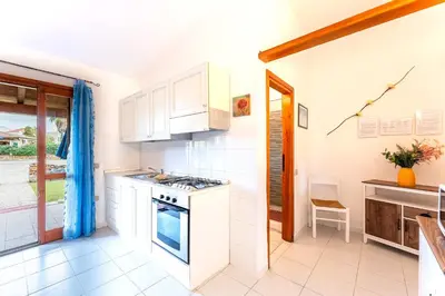 Cucina o angolo cottura di Residenze Gallura