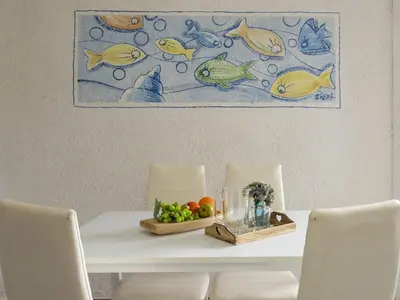 Area soggiorno di Apartment Iris 7- Terza Spiaggia by Interhome