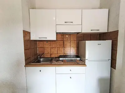Cucina o angolo cottura di Apartment Iris 7- Terza Spiaggia by Interhome