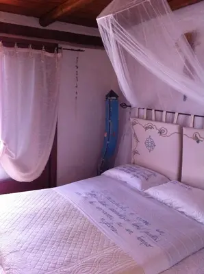 Letto o letti in una camera di La Casa delle Conchiglie