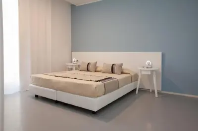 Letto o letti in una camera di Felix Hotels - Residenza Dante