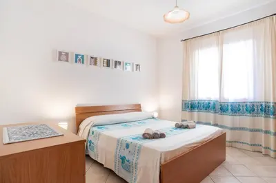 Letto o letti in una camera di Olbia Central Apartment