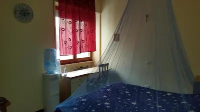 Letto o letti in una camera di B&B Le Mille E Una Notte