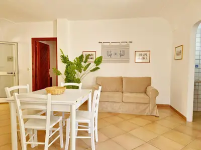 Area soggiorno di Villa Scogliera - Appartamenti con veranda a circa 700 mt dalla spiaggia di Fuile e Mare