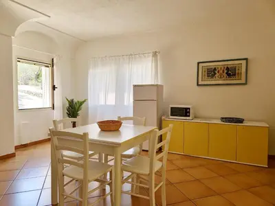Cucina o angolo cottura di Villa Scogliera - Appartamenti con veranda a circa 700 mt dalla spiaggia di Fuile e Mare