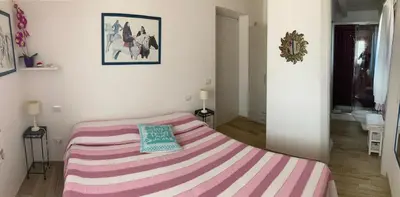 Letto o letti in una camera di Punta Sirenella