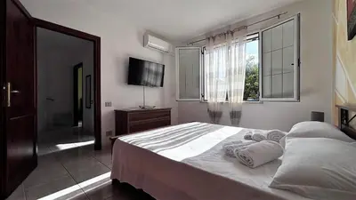 Letto o letti in una camera di Borgo San Teodoro 2