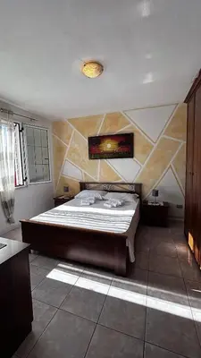 Letto o letti in una camera di Borgo San Teodoro 2