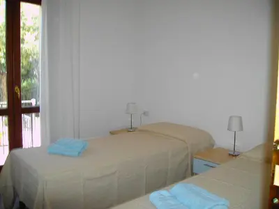 Letto o letti in una camera di Gli Ulivi