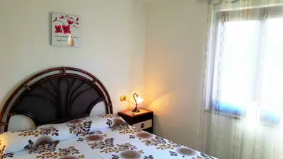 Letto o letti in una camera di Appartamento Ottiolu Mare
