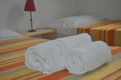Letto o letti in una camera di Capannizza Complex