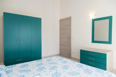 Letto o letti in una camera di San Teodoro