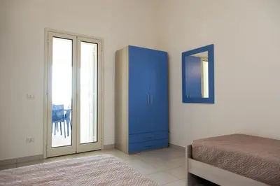 Letto o letti in una camera di San Teodoro