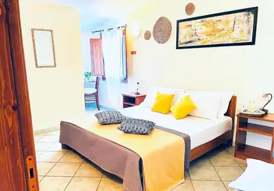 Letto o letti in una camera di Hotel Velasole
