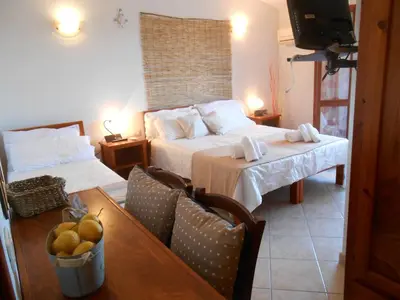 Letto o letti in una camera di Hotel Velasole