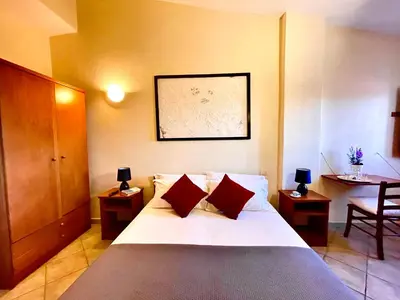 Letto o letti in una camera di Hotel Velasole
