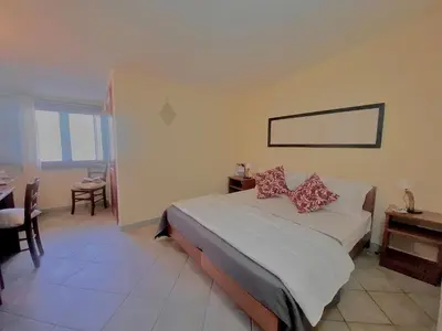 Letto o letti in una camera di Hotel Velasole
