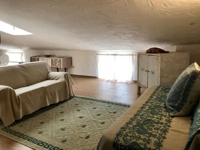 Letto o letti in una camera di Appartamento Leda
