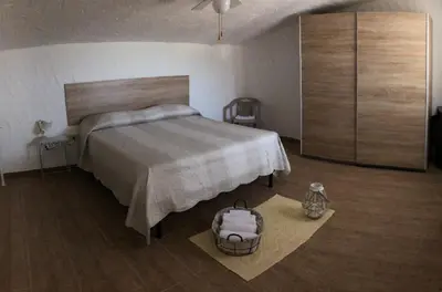 Letto o letti in una camera di Appartamento Leda