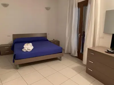 Letto o letti in una camera di Park 20 Appartamento