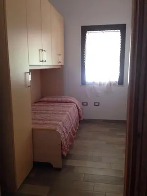 Letto o letti in una camera di Villa Gino