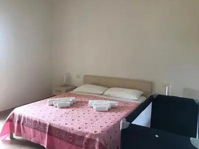 Letto o letti in una camera di Residence Arruli