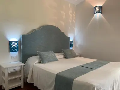Letto o letti in una camera di Relais BeneMari