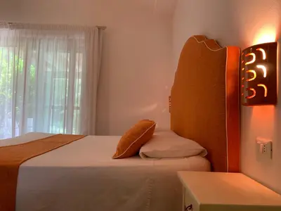 Letto o letti in una camera di Relais BeneMari