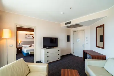 Letto o letti in una camera di Delta Hotels by Marriott Olbia Sardinia