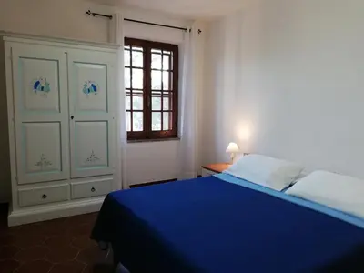 Letto o letti in una camera di La Cuppulata