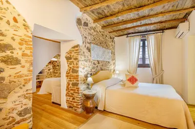 Letto o letti in una camera di Albergo Diffuso Mannois
