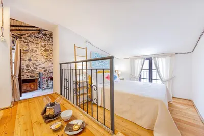 Letto o letti in una camera di Albergo Diffuso Mannois