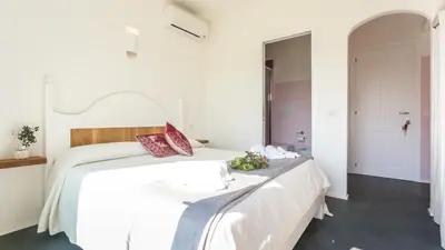 Letto o letti in una camera di Sardegna è - Villa Relax&Design
