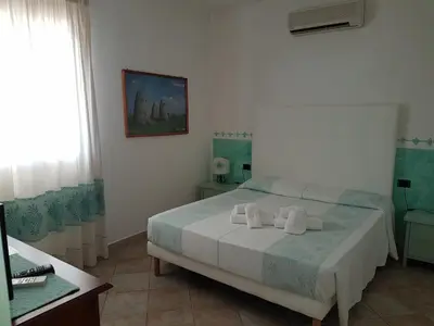 Letto o letti in una camera di Hotel Il Platano