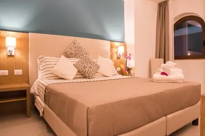Letto o letti in una camera di Hotel Maria
