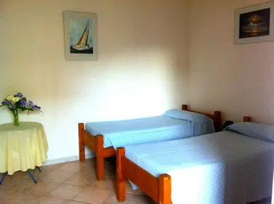 Letto o letti in una camera di B&b Sa Domo