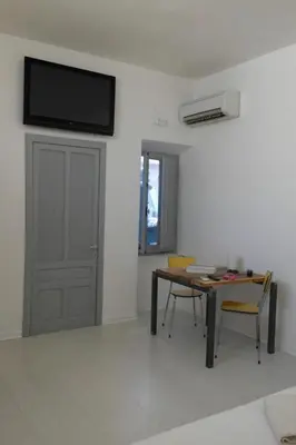 TV o dispositivi per l'intrattenimento presso My Eco Rooms Olbia