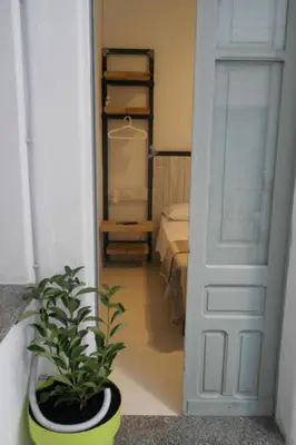 Letto o letti in una camera di My Eco Rooms Olbia