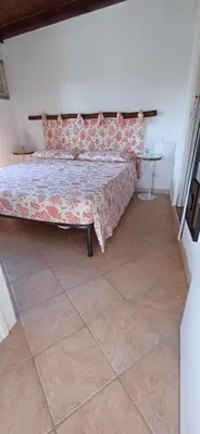 Letto o letti in una camera di La casetta a due passi dal mare con spiaggia privata