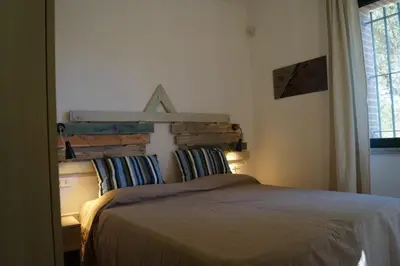 Letto o letti in una camera di Sa Tanca de Mannoi
