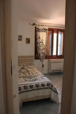 Letto o letti in una camera di Casa Degli Ulivi