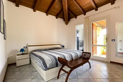 Letto o letti in una camera di LuxRent Villa Smeralda Pool and Beach